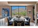 Dining room with seating and views of the mountain scenery and desert landscape at 35180 N Boulder Pass, Scottsdale, AZ 85266