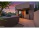 Home exterior with a private patio and desert mountain views at 35180 N Boulder Pass, Scottsdale, AZ 85266