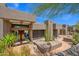Front exterior featuring desert landscaping at 35180 N Boulder Pass, Scottsdale, AZ 85266