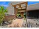 Front exterior with desert landscaping leading to the door at 35180 N Boulder Pass, Scottsdale, AZ 85266