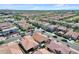 Expansive aerial view of a residential neighborhood with well-maintained homes and lush landscaping at 3634 E Perkinsville St, Gilbert, AZ 85295