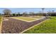 Outdoor bocce ball court with manicured gravel and grass at 3634 E Perkinsville St, Gilbert, AZ 85295