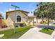Beautiful single-story home with arched window and stone accents and desert landscaping at 3634 E Perkinsville St, Gilbert, AZ 85295