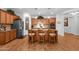 Spacious kitchen boasts a large island, wood floors, granite countertops, and stainless steel appliances at 3634 E Perkinsville St, Gilbert, AZ 85295