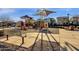 Community playground with modern equipment and seating at 3634 E Perkinsville St, Gilbert, AZ 85295