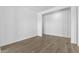 Clean, minimalist room with neutral paint, tile floors, and ample natural light at 37735 W Santa Maria St, Maricopa, AZ 85138