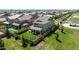 Expansive aerial view of a home featuring a backyard pool, lush lawn, and a charming covered patio at 3818 E Appaloosa Rd, Gilbert, AZ 85296