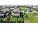 Aerial view of backyard, lawn, and neighborhood park nearby at 3818 E Appaloosa Rd, Gilbert, AZ 85296
