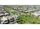 A scenic aerial shot of a home next to green space featuring a playground and walkways at 3818 E Appaloosa Rd, Gilbert, AZ 85296