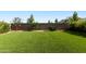 Spacious backyard featuring a well-maintained lawn and mature landscaping at 3818 E Appaloosa Rd, Gilbert, AZ 85296