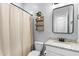 Neutral bathroom featuring a white vanity with granite countertop and a shower with curtain at 3818 E Appaloosa Rd, Gilbert, AZ 85296
