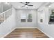 Hallway with stairs to the second floor and light gray walls at 3818 E Appaloosa Rd, Gilbert, AZ 85296
