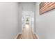 Bright hallway with wood floors leading to a living room at 3818 E Appaloosa Rd, Gilbert, AZ 85296