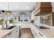 Spacious kitchen featuring granite countertops, stainless steel appliances, and white cabinets at 3818 E Appaloosa Rd, Gilbert, AZ 85296