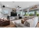 Spacious living room featuring a large television and comfortable seating at 3818 E Appaloosa Rd, Gilbert, AZ 85296