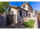Charming backyard with well-maintained landscaping and a private fenced area at 3837 E Santa Fe Ln, Gilbert, AZ 85297
