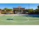 Community basketball court with a covered bench area, perfect for recreation at 3837 E Santa Fe Ln, Gilbert, AZ 85297