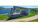 Architectural shade structure at a community park featuring a scenic lake backdrop at 3837 E Santa Fe Ln, Gilbert, AZ 85297