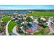 Aerial view of a vibrant splash pad and playground perfect for community families at 3837 E Santa Fe Ln, Gilbert, AZ 85297
