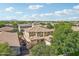 Aerial view of large home with desert landscaping and tile roof at 4109 E Sierra Madre Ave, Gilbert, AZ 85296