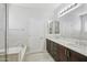 Bathroom features double vanity, marble countertops, soaking tub and tiled floors at 4109 E Sierra Madre Ave, Gilbert, AZ 85296