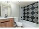 Modern bathroom featuring updated fixtures and stylish patterned tile at 4228 N 81St St, Scottsdale, AZ 85251