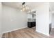 Bright dining area with hardwood flooring and a view into the modern kitchen at 4228 N 81St St, Scottsdale, AZ 85251