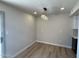 Dining room with hardwood floors, modern light fixtures and bright natural light at 4228 N 81St St, Scottsdale, AZ 85251