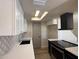 Bright kitchen features white cabinets, stainless steel appliances, and modern backsplash at 4228 N 81St St, Scottsdale, AZ 85251