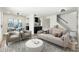 Inviting living room featuring comfortable seating, modern decor, and seamless flow to the dining area at 4228 N 81St St, Scottsdale, AZ 85251