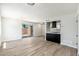 Bright and spacious living area with a sliding door and seamless transition to the modern kitchen at 4228 N 81St St, Scottsdale, AZ 85251