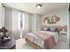 Stylishly decorated bedroom featuring a queen-sized bed and modern decor at 4228 N 81St St, Scottsdale, AZ 85251