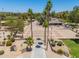 An aerial image captures a landscaped park area with walking paths, tall palm trees, and open recreational spaces at 4228 N 81St St, Scottsdale, AZ 85251