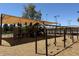 Community playground with swings, climbing structures and picnic tables under a shaded canopy at 4228 N 81St St, Scottsdale, AZ 85251