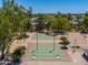 Overhead image of the cornhole recreational area with green turf, mature trees and a covered picnic structure at 4228 N 81St St, Scottsdale, AZ 85251
