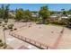 Aerial view of a common recreational area featuring a shuffleboard court and other outdoor activities at 4228 N 81St St, Scottsdale, AZ 85251