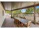 The covered back patio offers an ideal spot for outdoor gatherings at 502 W Port Royale Ln, Phoenix, AZ 85023