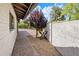 Serene side yard space with gravel landscaping at 502 W Port Royale Ln, Phoenix, AZ 85023