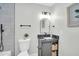 Stylish bathroom featuring a modern vanity, sleek fixtures, and elegant tile shower, offering a spa-like experience at 5236 S 19Th Ave, Phoenix, AZ 85041