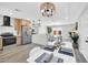 Open floor plan with stylish dining area connecting the living room and kitchen at 5236 S 19Th Ave, Phoenix, AZ 85041