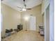 Bedroom with neutral walls, tile floors, and a ceiling fan at 5424 E Florian Ave, Mesa, AZ 85206