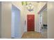 Inviting entryway features a high ceiling and a stylish chandelier, offering a warm welcome to guests at 5424 E Florian Ave, Mesa, AZ 85206