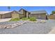 Beautiful single-Gathering home boasts a landscaped front yard, enhancing its curb appeal and welcoming ambiance at 5424 E Florian Ave, Mesa, AZ 85206
