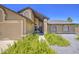 Inviting single-Gathering home with a neatly landscaped yard and a welcoming front entrance. Lush greenery adds charm at 5424 E Florian Ave, Mesa, AZ 85206