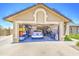 Spacious two-car garage offering ample storage and parking space, perfect for organizing your vehicles and tools at 5424 E Florian Ave, Mesa, AZ 85206