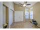 Bright living room featuring vaulted ceiling, neutral walls, and tile flooring at 5424 E Florian Ave, Mesa, AZ 85206