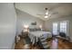 Spacious bedroom featuring vaulted ceiling, ceiling fan and exterior access at 5424 E Florian Ave, Mesa, AZ 85206