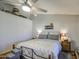 Spacious bedroom featuring vaulted ceiling, ceiling fan and walk-in closet at 5424 E Florian Ave, Mesa, AZ 85206