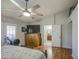 Spacious bedroom featuring vaulted ceiling, ceiling fan and exterior access at 5424 E Florian Ave, Mesa, AZ 85206
