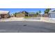Exterior of a single-Gathering home with gravel front yard, driveway, and a well-maintained exterior in view at 5424 E Florian Ave, Mesa, AZ 85206
